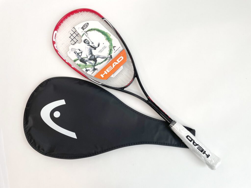 New Squash racket with its bag